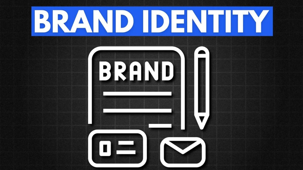 A white document with the word "BRAND" written on it, a pencil, and a business card and envelope icon. The text "BRAND IDENTITY" is in blue above the image.