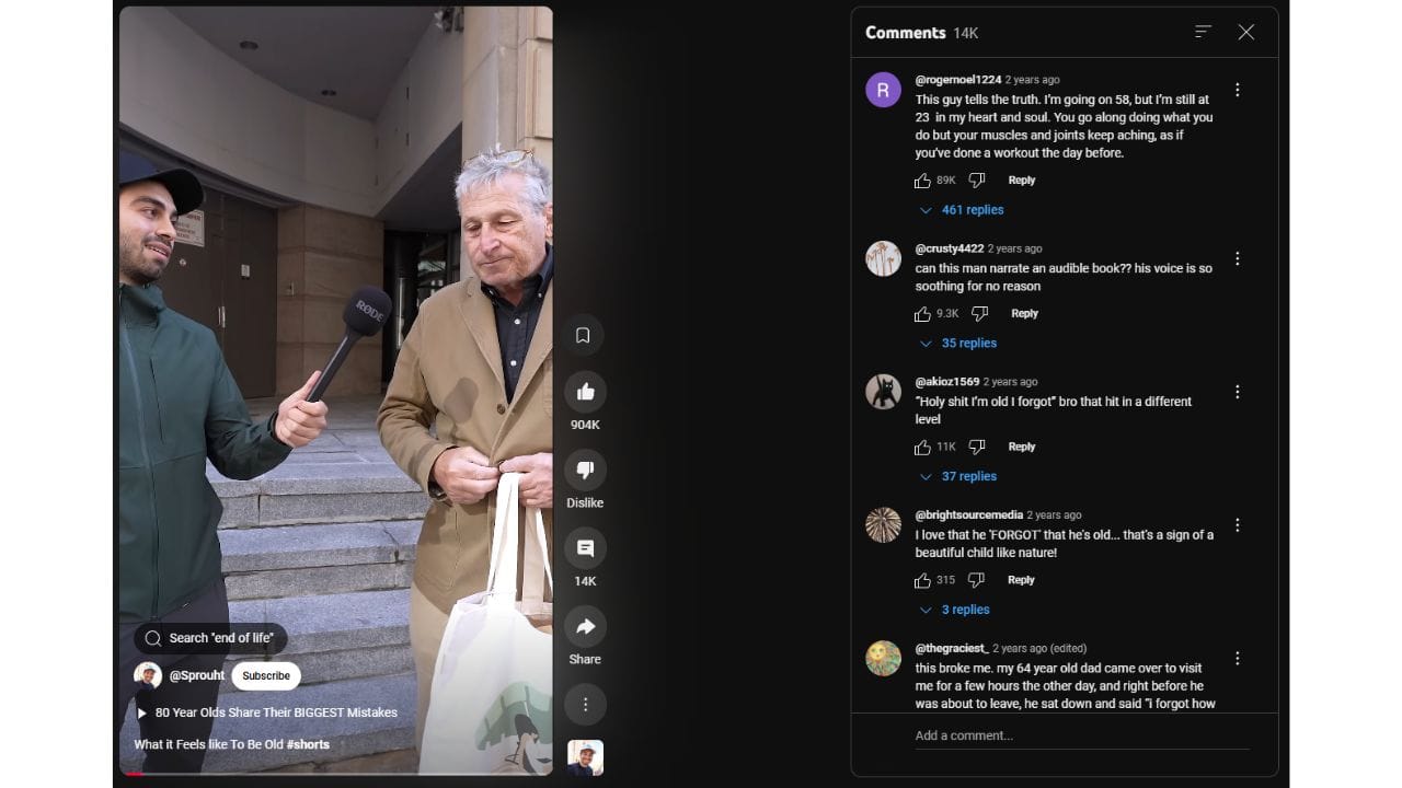 A YouTube video frame shows a young man with a microphone interviewing an older man on a city street. The video title is "80 Year Olds Share Their BIGGEST Mistakes." The YouTube channel name is "Sprouht" with 1.04M subscribers. The video has 904K views, 14K comments, and a like/dislike ratio. The comment section is open on the right side of the screen, featuring comments from viewers who relate to the experiences shared in the video. The comments highlight the emotional impact of the video and the relatable experiences of aging.